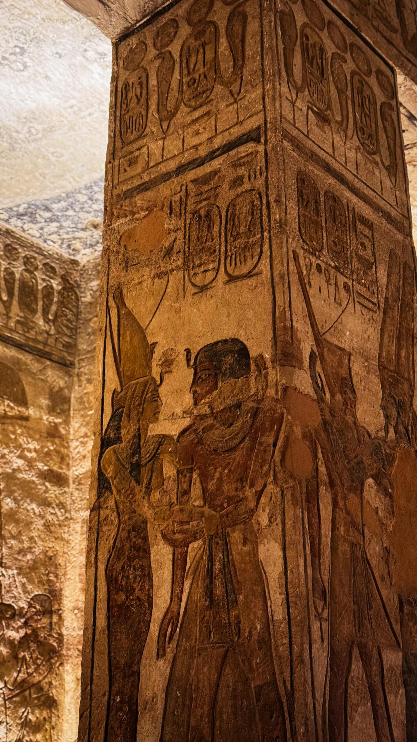 Explore the mystery of ancient Egyptian hieroglyphics on a temple column.